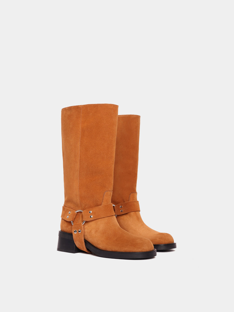 Knee-high honey suede moto boots with a silver harness