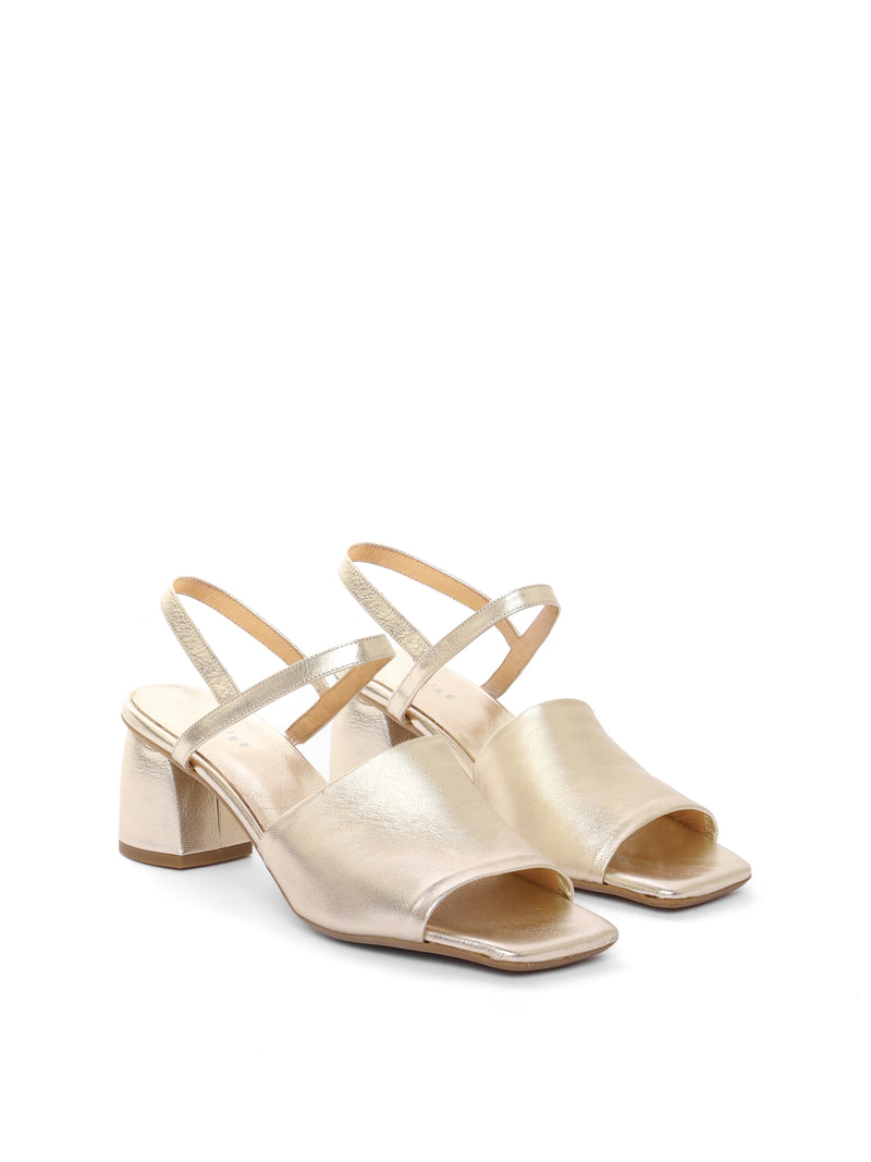 Gold leather block heels with an ankle strap