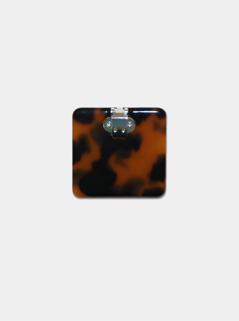 Ecom image of a square tortoise coloured shoe clip, back clasp view